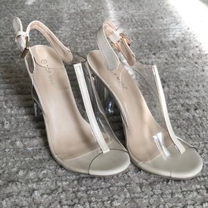 Clear heels . Never worn.